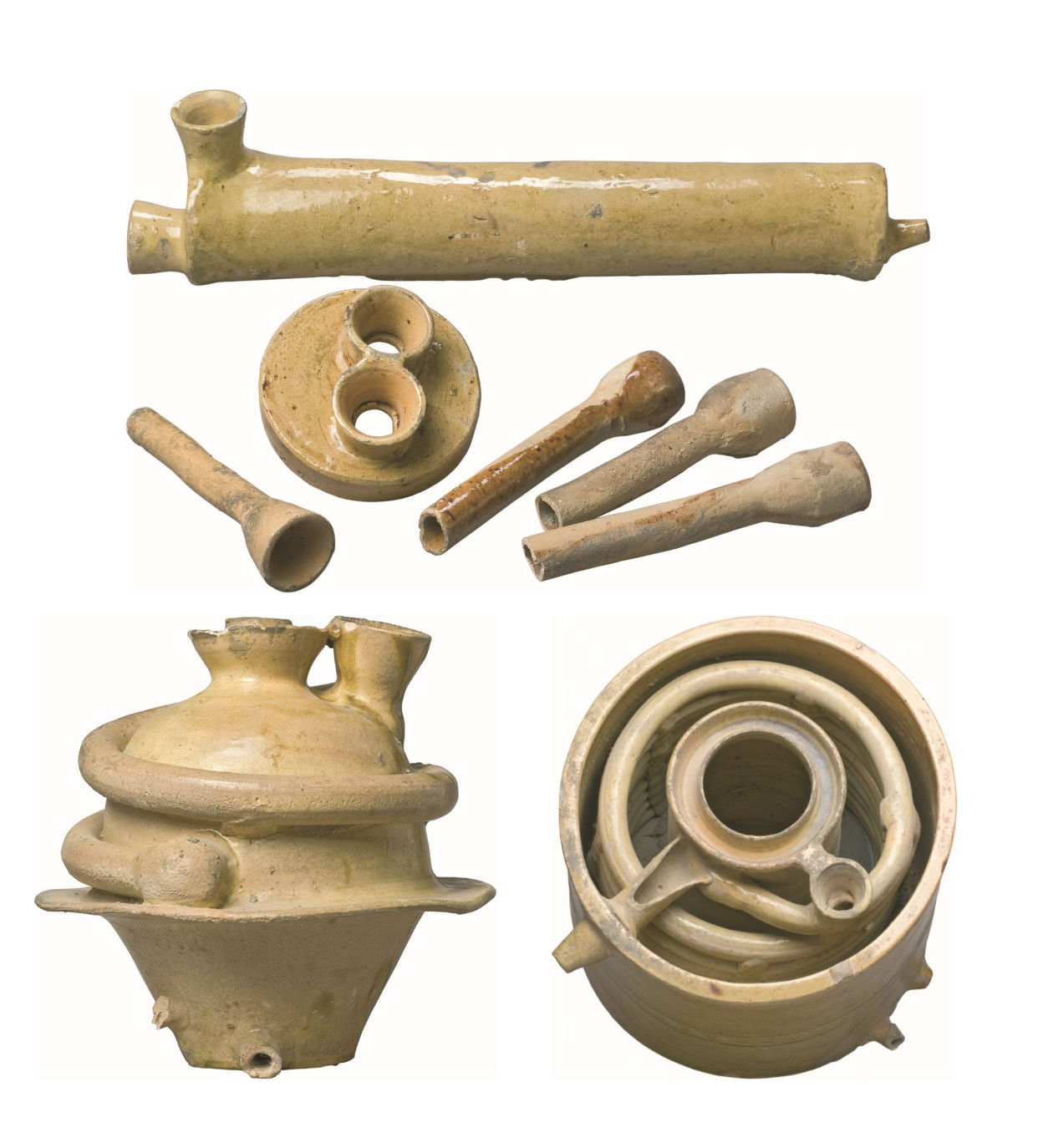 Cette image présente divers objets en céramique. On y voit un long tube avec une embouchure, probablement utilisé pour le passage de l'air ou de l'eau. Il y a aussi des petites pipes ou embouts, ainsi qu'un récipient arrondi qui semble avoir été sculpté avec des motifs. Un autre objet en bas à droite montre une structure en spirale, ce qui indique une fonctionnalité peut-être liée à la distillation ou à la filtration. L'ensemble suggère une collection d'instruments anciens, potentiellement liés à des pratiques de consommation ou de préparation de substances.