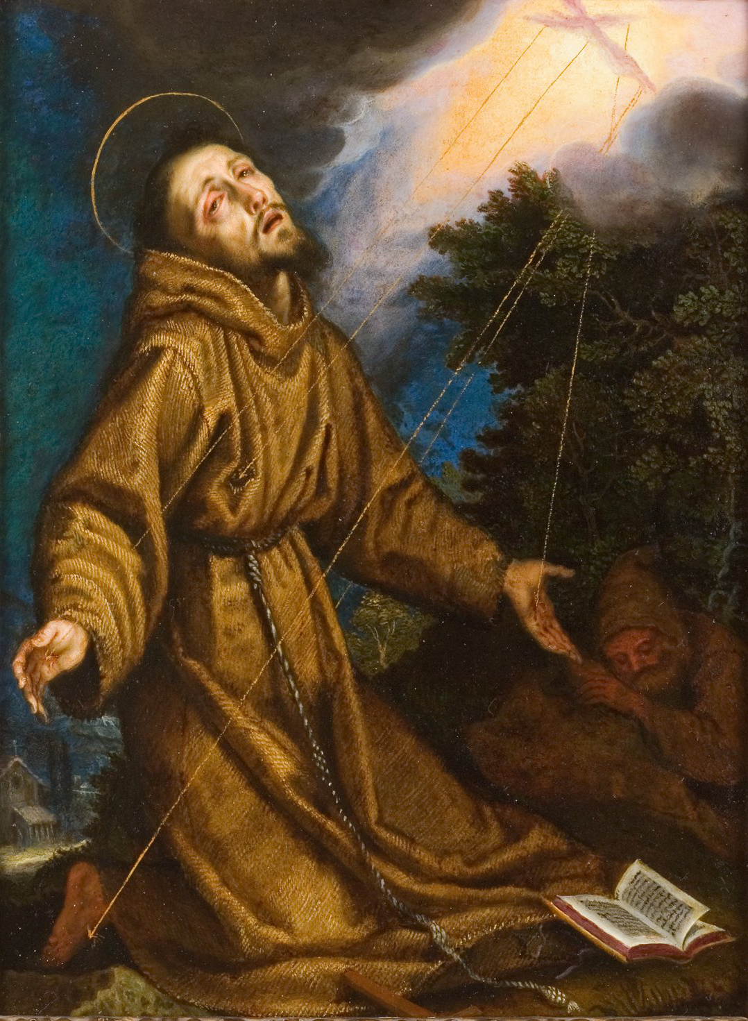 L'image représente une scène religieuse avec un saint, probablement Saint François d'Assise, en prière. Il est vêtu d'une robe marron, avec des bras ouverts, semblant recevoir une lumière divine qui provient d'en haut. Son expression faciale dénote une profonde concentration spirituelle et une connexion avec le ciel. À l'arrière-plan, on aperçoit un paysage avec des arbres et une petite maison, tandis qu'une autre figure, probablement un compagnon ou un ermite, se trouve recroquevillée dans l'ombre. Un livre ouvert est également visible, ajoutant une dimension de méditation et de connaissance à la scène. Les rayons de lumière qui descendent du ciel ajoutent à l'atmosphère mystique de l'œuvre.